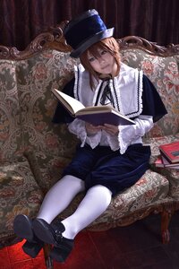 Rating: Safe Score: 0 Tags: 1boy blue_eyes book boots brown_hair crossed_legs hat long_hair shorts sitting solo souseiseki top_hat white_legwear User: admin