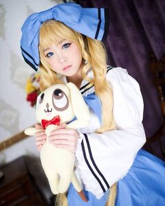 Rating: Safe Score: 0 Tags: 1girl blonde_hair blue_eyes blurry bow bowtie depth_of_field dress holding holding_stuffed_toy lips long_hair long_sleeves looking_at_viewer photo shinku solo User: admin