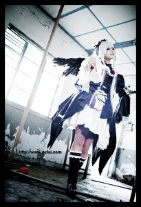 Rating: Safe Score: 0 Tags: 1girl black_border boots dress gun indoors letterboxed long_hair looking_at_viewer rifle solo standing suigintou weapon white_hair User: admin