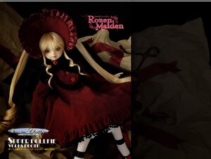 Rating: Safe Score: 0 Tags: 1girl blonde_hair blue_eyes bonnet copyright_name doll dress frills letterboxed long_hair long_sleeves rose shinku sitting solo twintails umbrella User: admin
