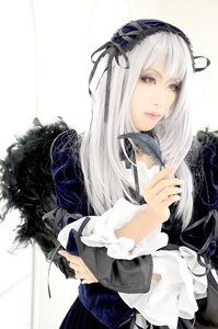 Rating: Safe Score: 0 Tags: 1girl bangs black_ribbon closed_mouth frills gothic_lolita hairband long_hair long_sleeves looking_at_viewer red_eyes ribbon silver_hair solo suigintou white_background white_hair User: admin