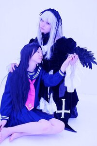 Rating: Safe Score: 0 Tags: 2girls bangs barefoot closed_eyes hairband kakizaki_megu long_hair long_sleeves multiple_girls school_uniform sitting skirt solo suigintou wings User: admin
