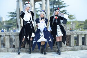 Rating: Safe Score: 0 Tags: 3girls black_footwear blurry blurry_background boots depth_of_field hair_ornament hat long_hair looking_at_viewer multiple_girls outdoors silver_hair solo suigintou User: admin