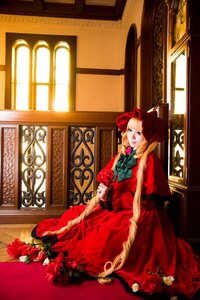 Rating: Safe Score: 0 Tags: 1girl blonde_hair blue_eyes book bow brooch dress flower hair_ribbon indoors long_hair painting_(object) red_dress red_flower ribbon rose shinku sitting solo window User: admin