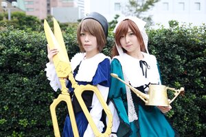 Rating: Safe Score: 0 Tags: 2girls blue_dress blurry brown_hair building depth_of_field dress head_scarf hood multiple_cosplay multiple_girls outdoors suiseiseki tagme User: admin