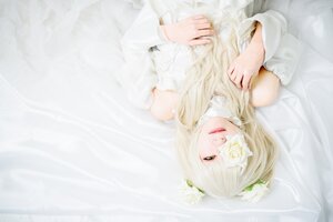 Rating: Safe Score: 0 Tags: 1girl bare_shoulders blonde_hair dress eyepatch flower hair_flower hair_ornament kirakishou lips long_hair rose solo white_flower white_rose User: admin