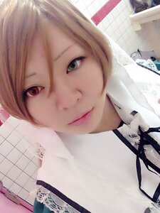 Rating: Safe Score: 0 Tags: 1girl bangs building closed_mouth green_eyes lips looking_at_viewer short_hair smile solo suiseiseki User: admin