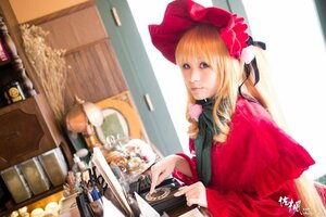 Rating: Safe Score: 0 Tags: 1girl blonde_hair blue_eyes bonnet book curtains flower food indoors lips shinku solo window User: admin