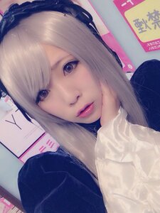 Rating: Safe Score: 0 Tags: 1girl bangs closed_mouth lips looking_at_viewer nose photo signature solo suigintou sweater upper_body User: admin