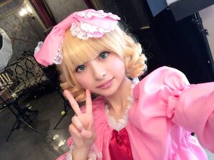 Rating: Safe Score: 0 Tags: 1girl bangs blonde_hair dress hinaichigo lips lolita_fashion looking_at_viewer pink_dress short_hair smile solo umbrella upper_body v User: admin