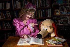 Rating: Safe Score: 0 Tags: 1girl blonde_hair book book_stack bookshelf hat hinaichigo library realistic solo stuffed_animal User: admin