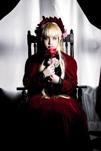 Rating: Safe Score: 0 Tags: 1girl bangs blonde_hair blue_eyes bonnet curtains dress flower long_sleeves looking_at_viewer red_dress rose shinku sitting solo User: admin