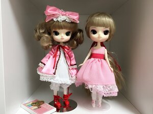 Rating: Safe Score: 0 Tags: 2girls bangs blonde_hair bloomers bow doll dress frills hair_bow hina_ichigo hinaichigo multiple_girls pink_bow pink_dress pink_footwear red_footwear ribbon shoes short_hair solo standing underwear User: admin