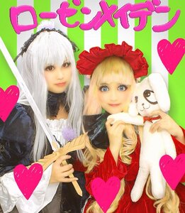 Rating: Safe Score: 0 Tags: 2girls 91076 blonde_hair blue_eyes heart heart_hands heart_hands_duo long_hair multiple_cosplay multiple_girls shinku smile spoken_heart tagme traditional_media User: admin