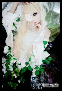 Rating: Safe Score: 0 Tags: 1girl blonde_hair dress flower hair_over_one_eye kirakishou leaf letterboxed lips long_hair solo User: admin