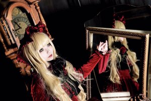Rating: Safe Score: 0 Tags: 1girl blonde_hair blue_eyes bow dress flower instrument long_hair long_sleeves music piano playing_instrument rose shinku solo User: admin