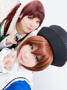 Rating: Safe Score: 0 Tags: 2girls 3d bangs blue_eyes brown_hair closed_mouth hat heterochromia index_finger_raised lips looking_at_viewer multiple_cosplay multiple_girls red_eyes short_hair siblings sisters smile souseiseki suiseiseki tagme twins User: admin