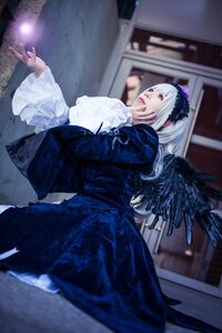 Rating: Safe Score: 0 Tags: 1girl bangs black_wings blurry blurry_background blurry_foreground depth_of_field dress feathered_wings feathers frills hairband indoors long_sleeves red_eyes solo stained_glass suigintou wings User: admin