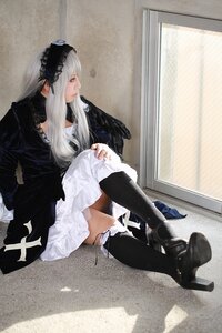 Rating: Safe Score: 0 Tags: 1girl black_legwear boots dress frills gothic_lolita hairband high_heel_boots high_heels indoors knee_boots lolita_fashion long_hair long_sleeves profile silver_hair sitting solo suigintou User: admin