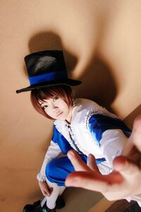 Rating: Safe Score: 0 Tags: 1girl blue_dress blurry blurry_foreground brown_hair depth_of_field dress green_eyes hat lips long_sleeves looking_at_viewer outstretched_arm pov realistic short_hair solo solo_focus souseiseki top_hat User: admin