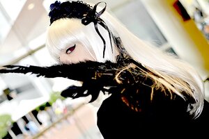 Rating: Safe Score: 0 Tags: 1girl blurry blurry_background blurry_foreground depth_of_field dress flower frills hairband long_hair looking_at_viewer motion_blur photo red_eyes solo suigintou white_hair User: admin