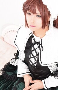 Rating: Safe Score: 0 Tags: 1girl bangs black_ribbon brown_hair closed_mouth dress lips lolita_fashion long_sleeves looking_at_viewer neck_ribbon ribbon short_hair solo suiseiseki User: admin