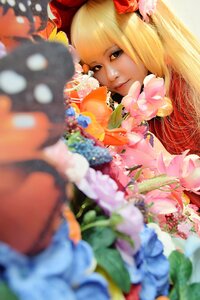 Rating: Safe Score: 0 Tags: 1girl blonde_hair blue_eyes blurry blurry_background blurry_foreground depth_of_field flower hair_flower hair_ornament lips long_hair looking_at_viewer motion_blur out_of_frame photo solo User: admin