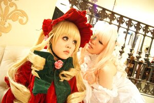 Rating: Safe Score: 0 Tags: 2girls 91076 blonde_hair blue_eyes bonnet dress flower lips long_hair multiple_cosplay multiple_girls red_dress rose shinku tagme User: admin