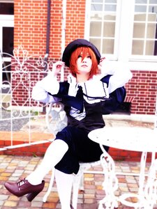 Rating: Safe Score: 0 Tags: 1girl blurry building city depth_of_field dress hat library long_sleeves pink_hair short_hair solo souseiseki User: admin