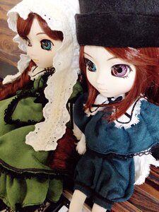 Rating: Safe Score: 0 Tags: 2girls brown_hair doll dress frills green_dress green_eyes hat heterochromia long_sleeves looking_at_viewer multiple_dolls multiple_girls red_eyes siblings sisters suiseiseki tagme twins User: admin