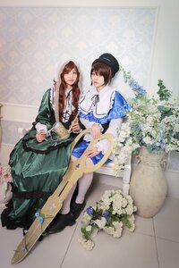 Rating: Safe Score: 0 Tags: 2girls blue_dress blue_eyes brown_hair cup dress flower green_dress hat long_hair multiple_cosplay multiple_girls pantyhose sitting tagme teapot white_legwear User: admin