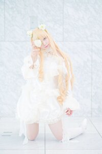 Rating: Safe Score: 0 Tags: 1girl blonde_hair dress flower hair_flower hair_ornament kirakishou kneeling long_hair solo striped white_dress white_flower User: admin