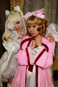 Rating: Safe Score: 0 Tags: 2girls blonde_hair blue_eyes bow curly_hair dress flower hair_flower hair_ornament hair_ribbon lips long_hair long_sleeves looking_at_viewer multiple_cosplay multiple_girls pink_dress realistic ribbon rose tagme User: admin