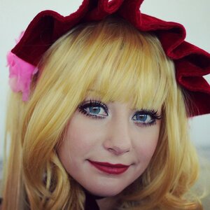 Rating: Safe Score: 0 Tags: 1girl bangs blonde_hair blue_eyes bow closed_mouth eyelashes lips looking_at_viewer nose portrait realistic ribbon shinku smile solo User: admin