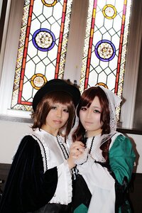 Rating: Safe Score: 0 Tags: 2girls bangs brown_hair dress green_eyes hat indoors looking_at_viewer multiple_cosplay multiple_girls short_hair smile stained_glass tagme window User: admin
