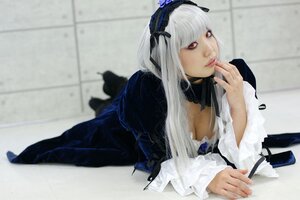 Rating: Safe Score: 0 Tags: 1girl 3d blurry cleavage depth_of_field dress feathers frilled_sleeves frills gothic_lolita hairband indoors lips lolita_fashion long_hair long_sleeves looking_at_viewer lying on_stomach photo red_eyes solo suigintou white_hair User: admin