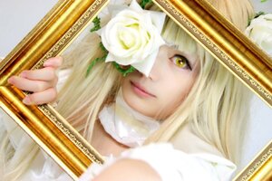 Rating: Safe Score: 0 Tags: 1girl bangs blonde_hair blurry depth_of_field flower hat instrument kirakishou lips long_hair looking_at_viewer photo rose solo white_flower white_rose yellow_eyes User: admin