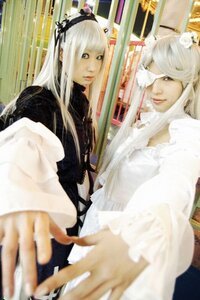 Rating: Safe Score: 0 Tags: 2girls 91076 bangs blurry blurry_foreground depth_of_field dress frills holding_hands long_hair looking_at_viewer multiple_cosplay multiple_girls photo sitting smile tagme white_hair User: admin