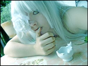 Rating: Safe Score: 0 Tags: 1girl black_border border cat kirakishou letterboxed lips realistic solo water User: admin