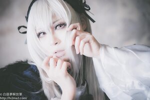 Rating: Safe Score: 0 Tags: 1girl bangs black_ribbon closed_mouth hair_ribbon hairband long_hair long_sleeves looking_at_viewer realistic ribbon solo suigintou upper_body watermark User: admin