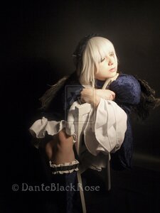 Rating: Safe Score: 0 Tags: 1girl bangs black_background blonde_hair closed_eyes dark dress lips long_hair long_sleeves realistic solo suigintou User: admin