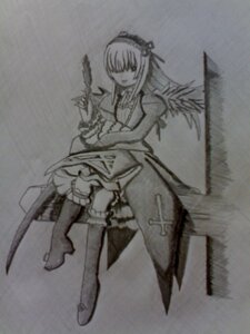 Rating: Safe Score: 0 Tags: 1girl bangs boots dress frills full_body greyscale hairband holding image knee_boots long_hair long_sleeves monochrome photo solo suigintou traditional_media User: admin