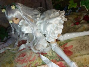 Rating: Safe Score: 0 Tags: 1girl doll dress flower frills kirakishou long_hair looking_back rose solo thighhighs very_long_hair yellow_eyes User: admin