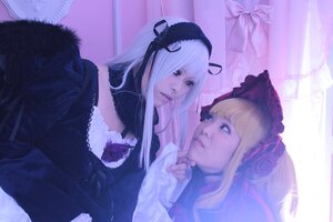 Rating: Safe Score: 0 Tags: 2girls 91076 bangs blonde_hair bonnet curtains flower lips long_hair multiple_cosplay multiple_girls realistic shinku suigintou tagme window User: admin