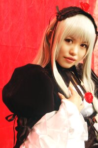 Rating: Safe Score: 0 Tags: 1girl auto_tagged bangs black_dress blonde_hair eyelashes flower gothic_lolita hairband lips long_hair long_sleeves looking_at_viewer realistic red_background red_flower red_rose rose solo suigintou upper_body User: admin