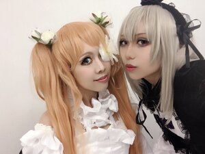 Rating: Safe Score: 0 Tags: 2girls blonde_hair blue_eyes flower hair_ornament lips long_hair looking_at_viewer multiple_cosplay multiple_girls realistic ribbon siblings sisters striped tagme twins User: admin