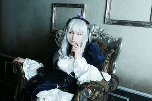 Rating: Safe Score: 0 Tags: 1girl dress frills indoors long_hair long_sleeves sitting solo suigintou wide_sleeves User: admin