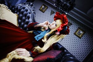 Rating: Safe Score: 0 Tags: 1girl blonde_hair blue_eyes dress long_hair out_of_frame polka_dot red_dress shinku sitting solo solo_focus User: admin