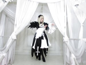 Rating: Safe Score: 0 Tags: 1girl blonde_hair cape curtain_grab curtains indoors solo standing suigintou white_hair window User: admin