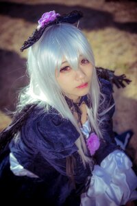 Rating: Safe Score: 0 Tags: 1girl blurry blurry_background choker depth_of_field dress flower gothic_lolita hair_flower hair_ornament lips long_hair long_sleeves looking_at_viewer realistic red_eyes solo suigintou upper_body User: admin